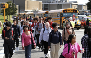 students by a bus