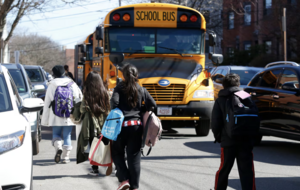 students walking to bus