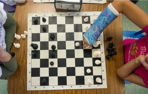 Students playing chess